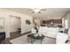 Open living room featuring a sectional sofa and a modern coffee table at 7089 Watercress St, Myrtle Beach, SC 29579