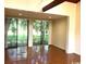Sunlit dining room with sliding glass doors leading to the backyard at 150 Wedgefield Village Rd. # 24, Georgetown, SC 29440