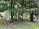 Rear exterior view showing building and private patio area at 150 Wedgefield Village Rd. # 24, Georgetown, SC 29440