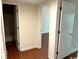 Hallway with doors leading to bedrooms and a bathroom at 150 Wedgefield Village Rd. # 24, Georgetown, SC 29440