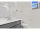 Clean bathroom with gray vanity, quartz countertop and a large mirror at 614 Castle Ct., Myrtle Beach, SC 29579