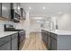 Modern kitchen with stainless steel appliances and gray cabinetry at 614 Castle Ct., Myrtle Beach, SC 29579