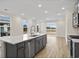 Modern kitchen with large island and access to backyard at 614 Castle Ct., Myrtle Beach, SC 29579