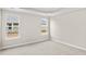 Spacious bedroom with neutral carpeting and large windows at 297 Broughton Dr., Myrtle Beach, SC 29579
