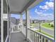 View of houses and a neighborhood green space from a home's balcony at 297 Broughton Dr., Myrtle Beach, SC 29579