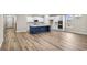Open floor plan with kitchen island and hardwood floors at 297 Broughton Dr., Myrtle Beach, SC 29579