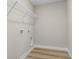 Laundry room with white wire shelving and vinyl flooring at 315 Broughton Dr., Myrtle Beach, SC 29579