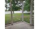 View from screened porch showcasing fenced backyard at 173 Rocko Dr., Myrtle Beach, SC 29579
