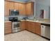 Modern kitchen featuring stainless steel appliances and wood cabinets at 173 Rocko Dr., Myrtle Beach, SC 29579