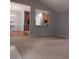 Open living room with kitchen pass-through and view into the kitchen at 173 Rocko Dr., Myrtle Beach, SC 29579
