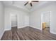 Bright bedroom with ceiling fan and access to bathroom and closet at 268 Maple Oak Dr., Conway, SC 29526