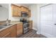Kitchen features stainless steel appliances and wood cabinets at 268 Maple Oak Dr., Conway, SC 29526
