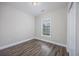 Simple bedroom with hardwood floors and a window at 268 Maple Oak Dr., Conway, SC 29526