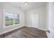 Bright bedroom with a large window, hardwood floors, and closet at 268 Maple Oak Dr., Conway, SC 29526