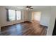 Bright living room with wood-look floors and access to dining area at 1103 Merrimac Dr., Conway, SC 29527