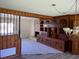 Spacious dining area featuring a brick fireplace and built-in cabinetry at 4155 Pinewood Dr., Mullins, SC 29574