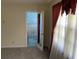 Clean bathroom with light blue tiled walls and a toilet at 4155 Pinewood Dr., Mullins, SC 29574