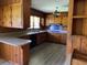 Kitchen with wood cabinets, laminate flooring, and appliances at 4155 Pinewood Dr., Mullins, SC 29574
