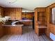 Kitchen with wood cabinetry, a breakfast bar and light flooring at 4155 Pinewood Dr., Mullins, SC 29574
