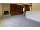 Living room with a brick fireplace and wood cabinetry at 4155 Pinewood Dr., Mullins, SC 29574