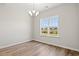 Bright dining area with a large window and hardwood floors at 3409 Little Bay Dr., Conway, SC 29526