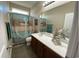 Bathroom with double vanity and an updated shower at 504 Windward Ct., Myrtle Beach, SC 29579