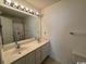 Bathroom with double vanity and floral shower curtain at 59-2 Rye Grass Ln. # 2, Pawleys Island, SC 29585