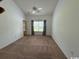 Spacious living room with vaulted ceiling and carpet at 59-2 Rye Grass Ln. # 2, Pawleys Island, SC 29585