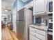 Kitchen with stainless steel refrigerator and granite countertops at 1525 Lanterns Rest Rd. # 203, Myrtle Beach, SC 29579