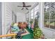 Relaxing sunroom offering a view and comfortable seating at 1525 Lanterns Rest Rd. # 203, Myrtle Beach, SC 29579