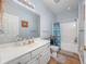 Neat bathroom with shower, toilet and white vanity at 1525 Lanterns Rest Rd. # 203, Myrtle Beach, SC 29579