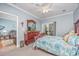 Spacious bedroom with a dresser and access to another room at 1525 Lanterns Rest Rd. # 203, Myrtle Beach, SC 29579