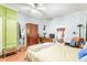 Bedroom with a double bed and built in wooden armoire at 406 N Nichols St., Nichols, SC 29581