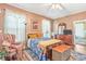Bedroom with a double bed, dresser, and sitting area at 406 N Nichols St., Nichols, SC 29581