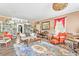 Living room with hardwood floors, comfortable seating, and a fireplace at 406 N Nichols St., Nichols, SC 29581