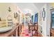 Bright dining room with hardwood floors and a charming chandelier at 406 N Nichols St., Nichols, SC 29581