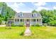 This charming house features a wraparound porch and a spacious yard at 406 N Nichols St., Nichols, SC 29581