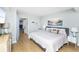 Bright bedroom with a king-size bed and coastal decor at 501 S Ocean Blvd. # 308, North Myrtle Beach, SC 29582