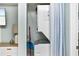 Compact laundry closet with stackable washer/dryer at 501 S Ocean Blvd. # 308, North Myrtle Beach, SC 29582