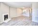 Spacious living room with hardwood floors and a view of the kitchen at 47 Shadow Moss Pl. # 47, North Myrtle Beach, SC 29582