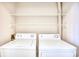 Laundry room with washer, dryer, and shelving at 47 Shadow Moss Pl. # 47, North Myrtle Beach, SC 29582