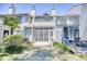 Two-story townhome with screened porch and private backyard at 47 Shadow Moss Pl. # 47, North Myrtle Beach, SC 29582