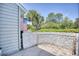 Private patio area with brick flooring and a stucco wall at 47 Shadow Moss Pl. # 47, North Myrtle Beach, SC 29582