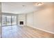 Bright living room featuring a fireplace and sliding glass doors to a patio at 47 Shadow Moss Pl. # 47, North Myrtle Beach, SC 29582