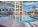 Inviting kidney-shaped pool with surrounding lounge chairs at 4800 South Ocean Blvd. # 1114, North Myrtle Beach, SC 29582
