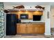 Well-equipped kitchen featuring granite counters and modern appliances at 4800 South Ocean Blvd. # 1114, North Myrtle Beach, SC 29582