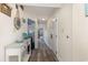 Hallway with coastal decor and hardwood floors at 4800 South Ocean Blvd. # 1114, North Myrtle Beach, SC 29582