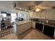 Well-equipped kitchen with granite countertops and modern appliances at 201 76Th Ave. N # C3, Myrtle Beach, SC 29572