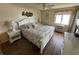 King bedroom with white furniture and oceanfront access at 201 76Th Ave. N # C3, Myrtle Beach, SC 29572