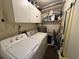 Small laundry room with washer, dryer and storage at 201 76Th Ave. N # C3, Myrtle Beach, SC 29572